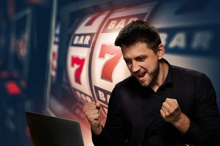 Happy online casino player after winning on a slot machine